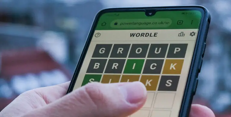 Person playing Wordle on their smartphone, showcasing the game interface