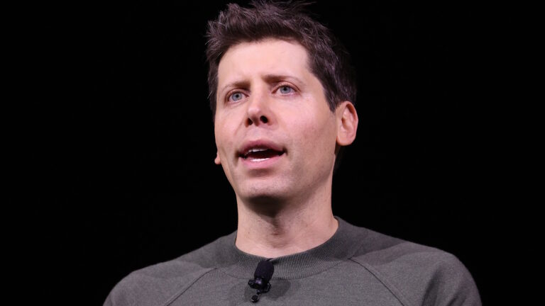 Sam Altman speaking at OpenAI DevDay event