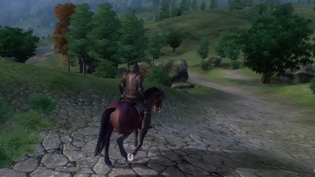 Oblivion - A player character riding a horse down a stone road through a grassy meadow