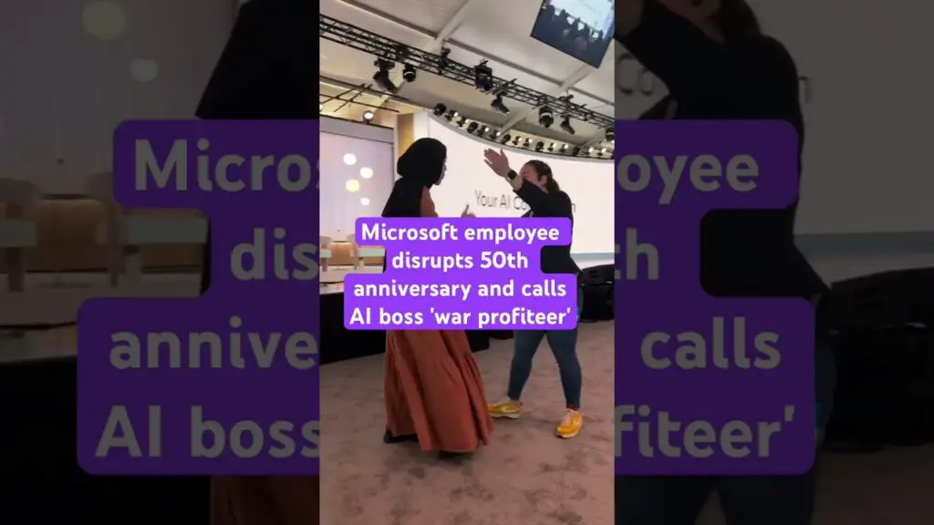 Microsoft employee disrupts 50th anniversary and calls AI boss 'war profiteer' - YouTube