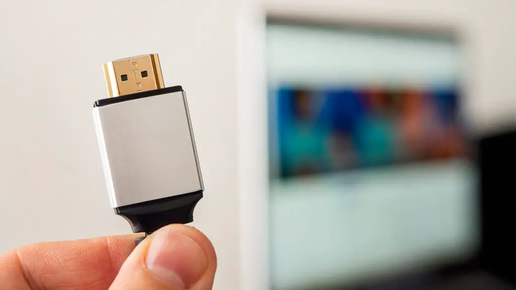 HDMI line connecting the audio and video system of notebook to projector or TV, illustrating current common cable setups