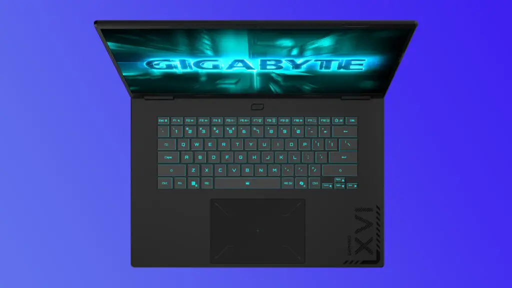 The Gigabyte Gaming A16 viewed from above, on a purple gradient background