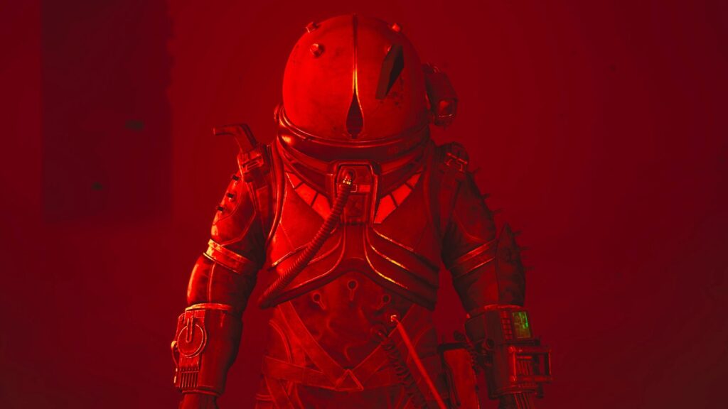 The Traveller just standing in a red room.