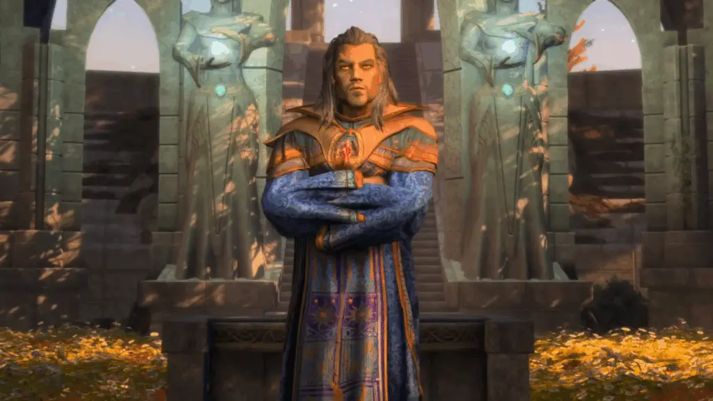 Mankar Camoran, an elf with a beard in blue-yellow robes, standing amid ayleid structure in Skyblivion