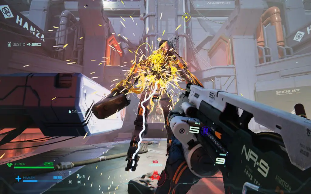 Sparks fly off a robot as it is shotgunned