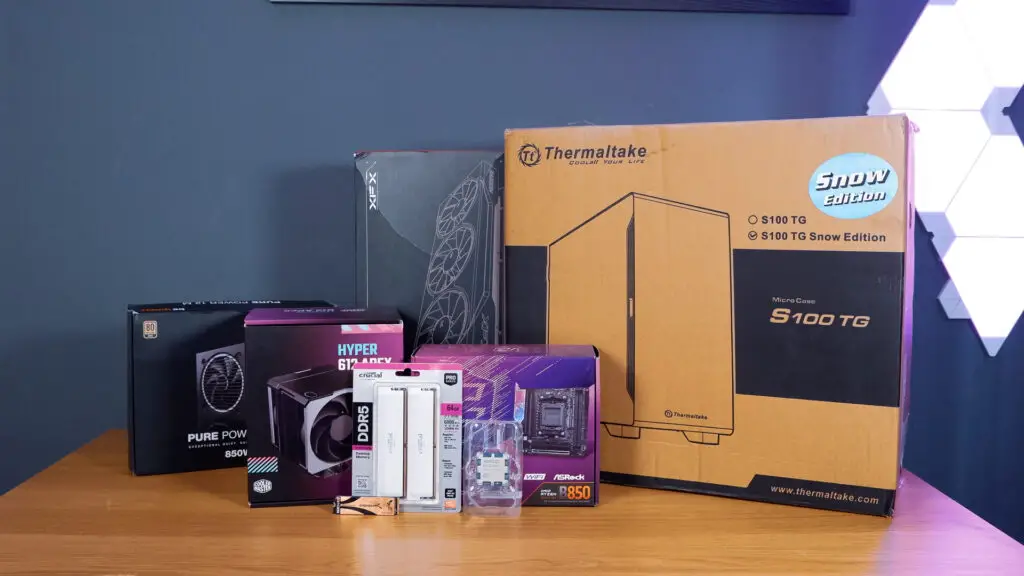 A white gaming PC built using a Thermaltake PC case, Cooler Master fans, and an AMD CPU.