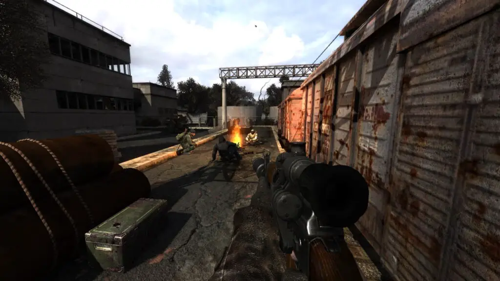 Approaching Stalkers sat outside a train carriage in Stalker Anomaly.