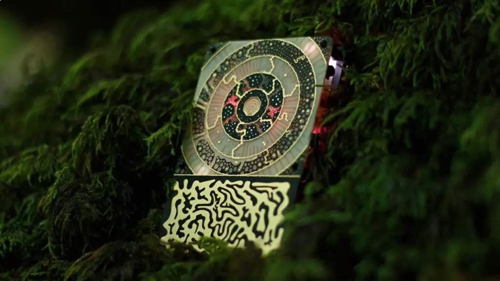 An Instruo Pocket Siren, a 'biofeedback instrument' that attaches directly to plants to make sounds, resting among some foliage