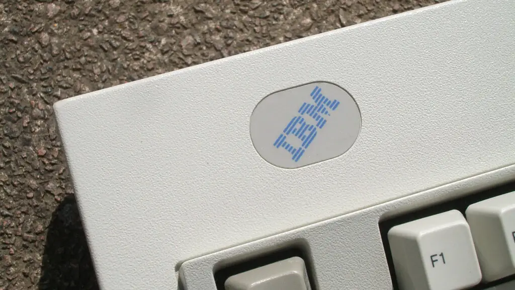 IBM Model M 1391406 (Greenock, UK ISO 1996) — blue label IBM logo in the top right of the keyboard.