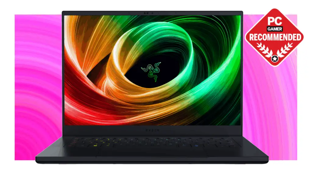 The Razer Blade 14 gaming laptop floats in the swirling pink PC G deal void.