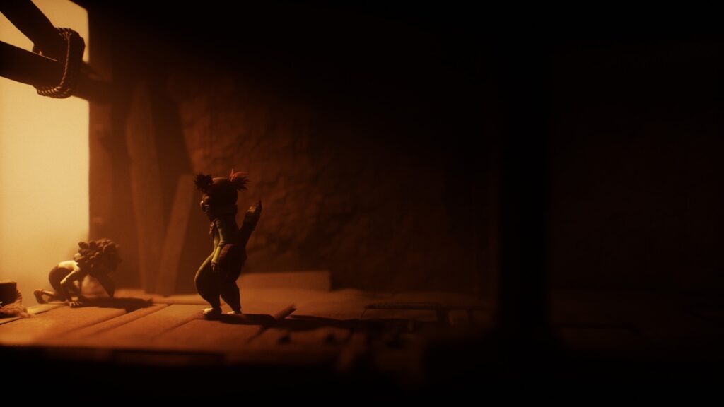 Low and Alone in Little Nightmares 3 after climbing a ladder from the desert into the Necropolis