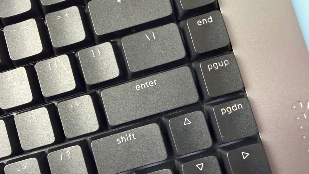 Lofree Flow 2 keyboard on a light blue background