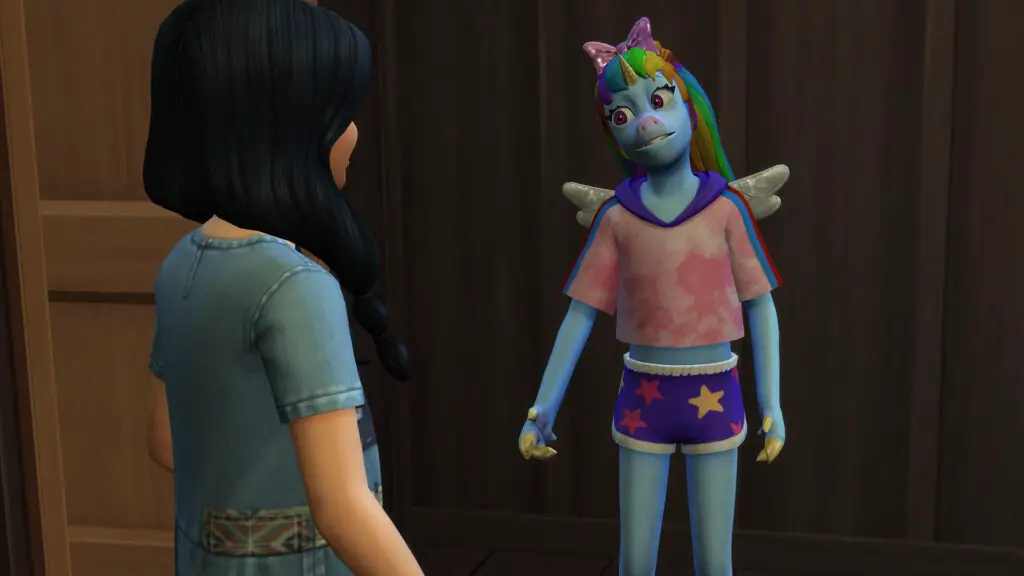 A fantastical-looking kid with blue skin, wings, and rainbow hair talking to a regular child Sim in the Sims 4 Adventure Awaits.