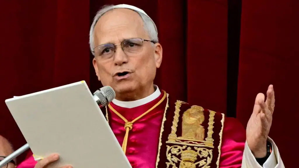 Newly elected Pope Leo XIV, Robert Prevost addresses the crowd on the main central loggia balcony of the St Peter's Basilica for the first time, after the cardinals ended the conclave, in The Vatican, on May 8, 2025. Robert Francis Prevost was on Thursday elected the first pope from the United States, the Vatican announced. A moderate who was close to Pope Francis and spent years as a missionary in Peru, he becomes the Catholic Church's 267th pontiff, taking the papal name Leo XIV. (Photo by TIZIANA FABI/AFP via Getty Images)