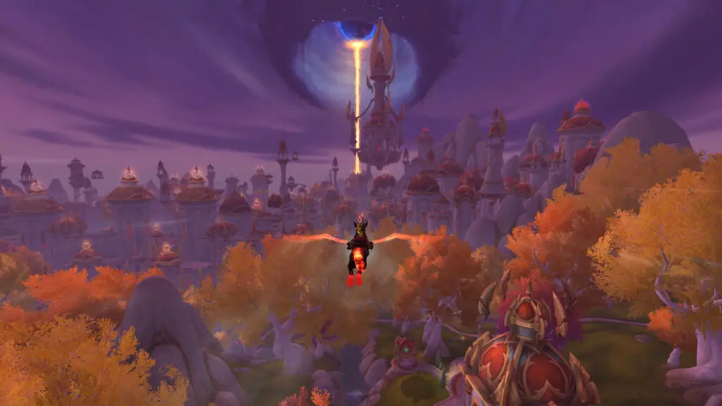 A screenshot of the World of Warcraft: Midnight alpha. A player character is flying on a mount across Eversong Woods. Bright orange trees cover the ground below and a city of red and gold spires is off in the distance. A dark purple hole in the sky has opened up and a beam of light from the city below is shooting upward to meet it.
