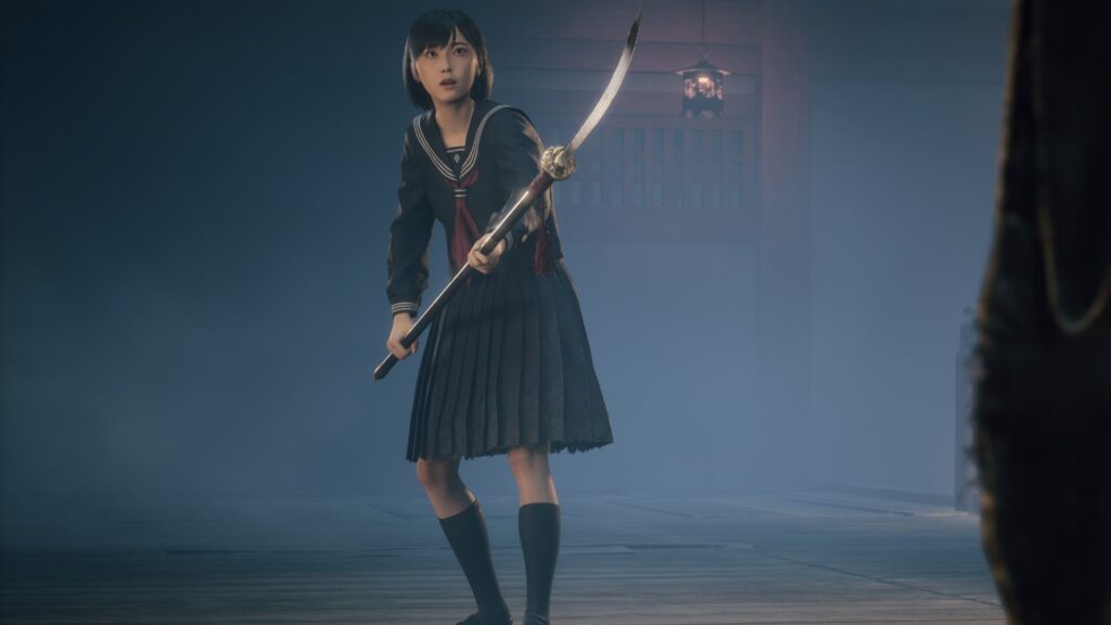 Hinako holds a naginata as she prepares for a boss fight
