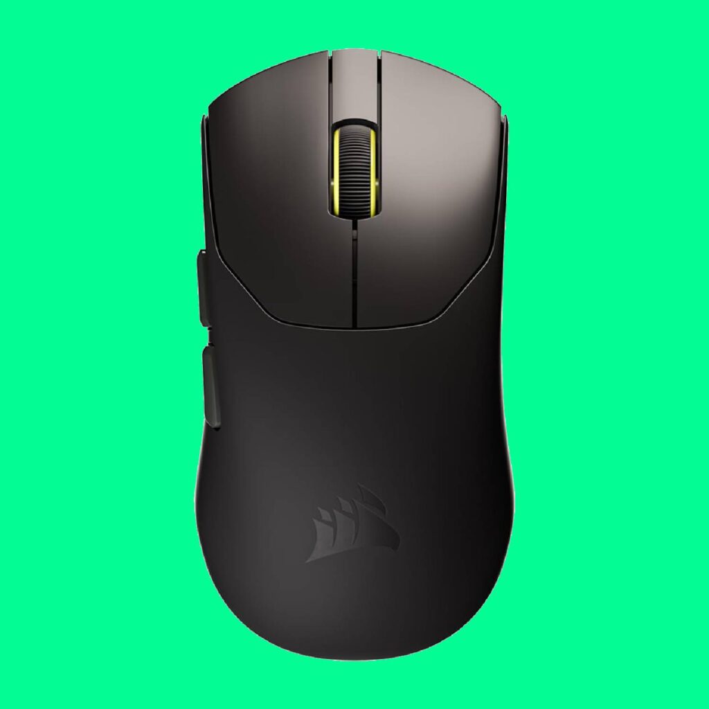 A Corsair Sabre V2 Pro gaming mouse on a green background