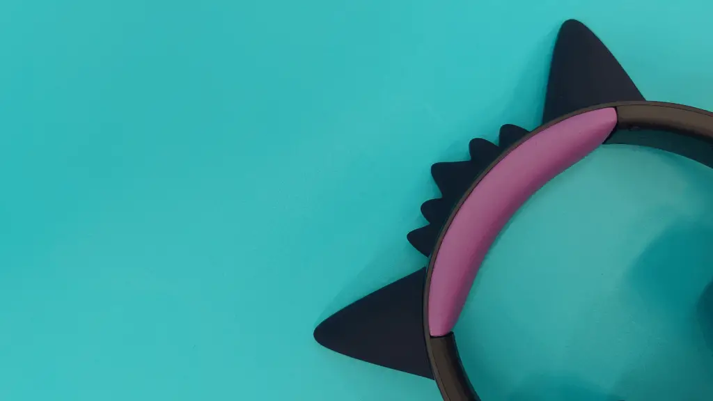 The Razer Kraken Kitty V2 - Gengar edition wired gaming headset is seen from various angles.