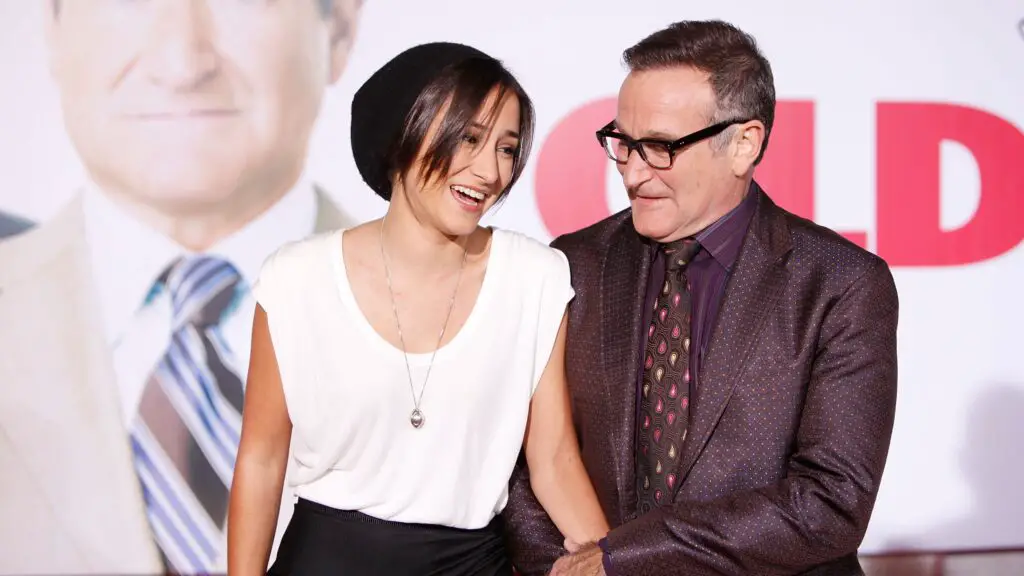 Zelda and Robin Williams share a laugh on the red carpet.