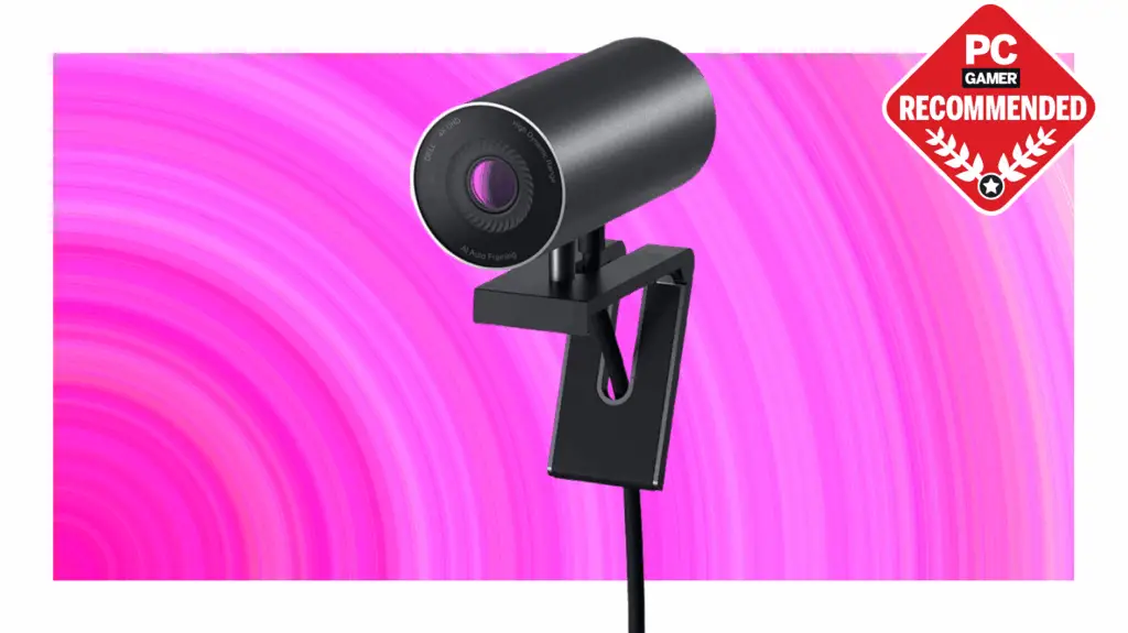 Dell UltraSharp WB7022 webcam on a pink background