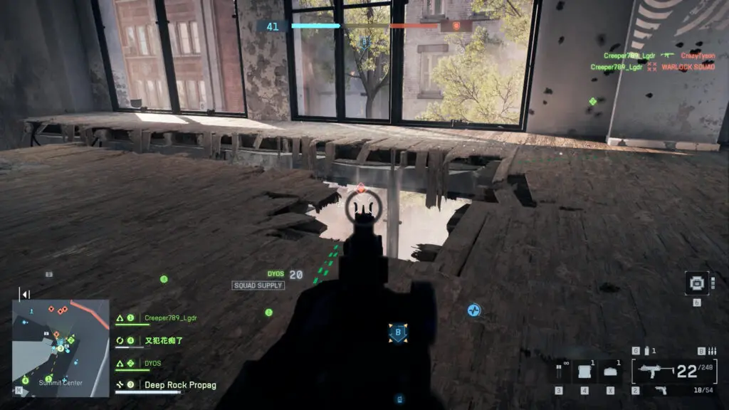 Battlefield 6 spotting: A player aiming an SMG through a hole in the floor at an enemy on the street in the distance.