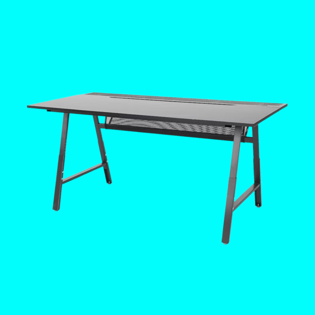 Ikea Utespelare gaming desk against a light blue background, showcasing its spacious design.