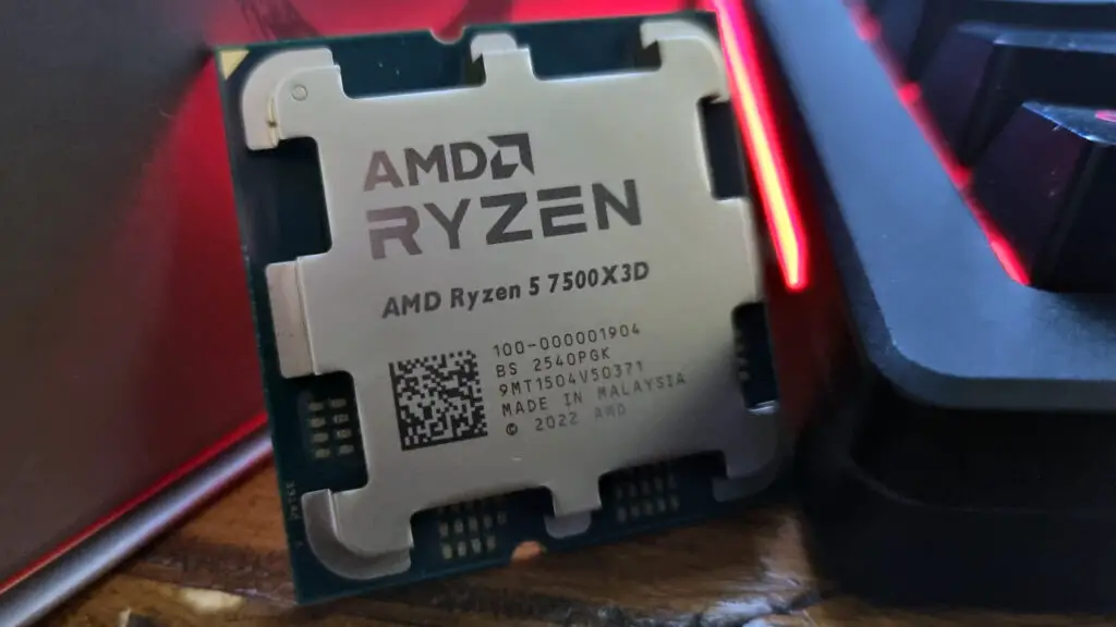 The AMD Ryzen 5 7500X3D lit in red from the rear