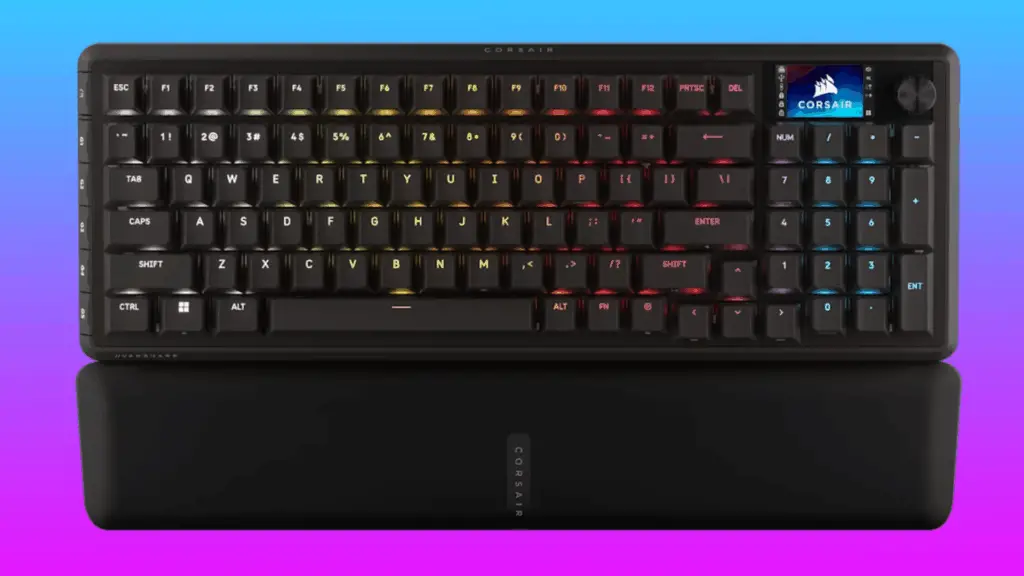 The Corsair Vanguard Pro 96 wired keyboard floats in a pink-blue gradient void.
