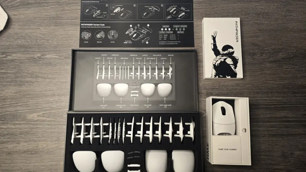 Orbital Pathfinder gaming mouse with various attachments.