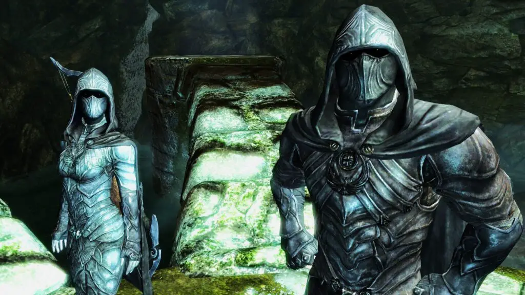 Two Skyrim thieves in leather nightingale armor regarding camera.