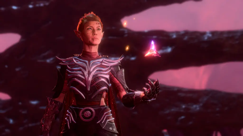 Baldur's Gate 3 protagonist handles magical polyhedron.