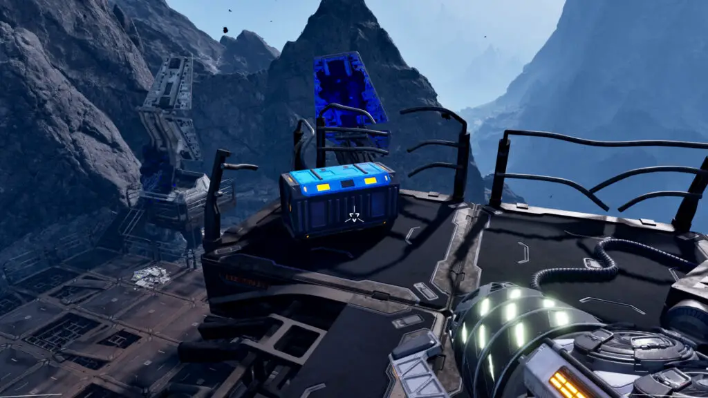 StarRupture Stabilizer blueprint: A player looking at a blue chest on an old tower in a mountain outpost, the location of the blueprint.