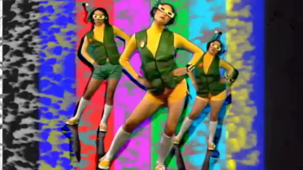 A trio of dancers in 3D glasses against a staticky backdrop