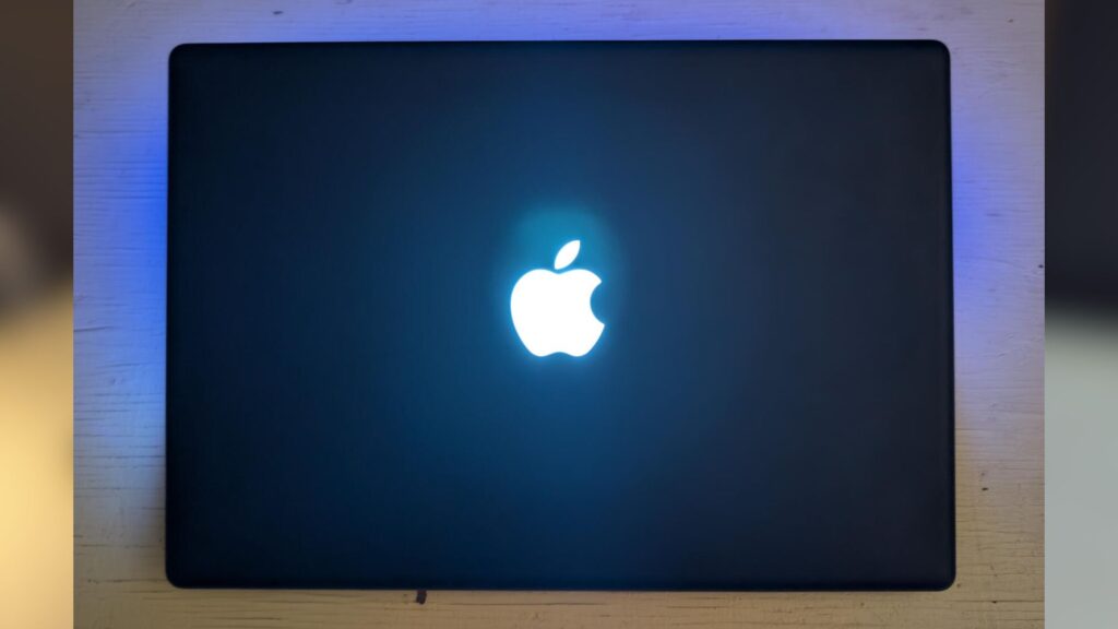 Interior view of the FrameBook showing the Framework motherboard and custom wiring