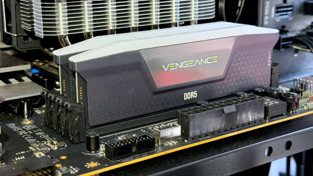 A photo of a DDR5 RAM kit by Corsair, mounted in a gaming PC motherboard