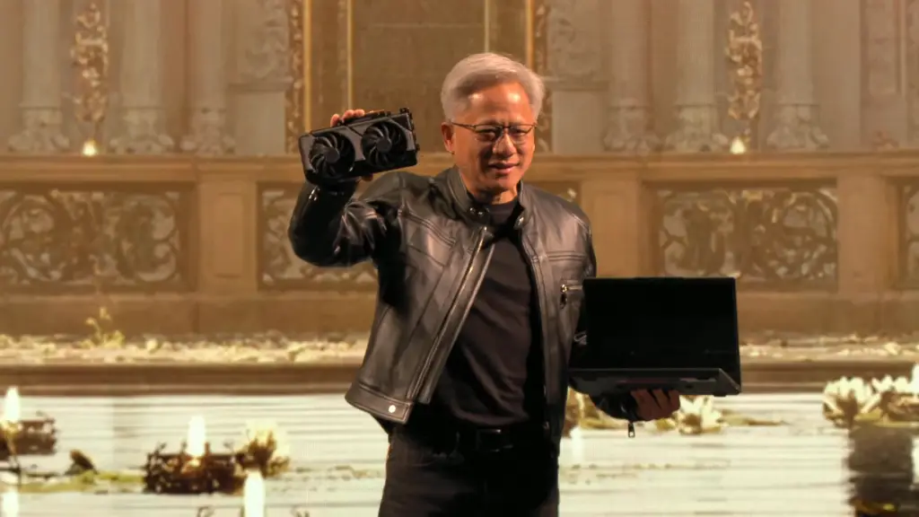 Jensen Huang holding aloft a Nvidia GeForce RTX 5060 graphics card alongside a similarly powered MSI laptop at Nvidia's Computex 2025 keynote.