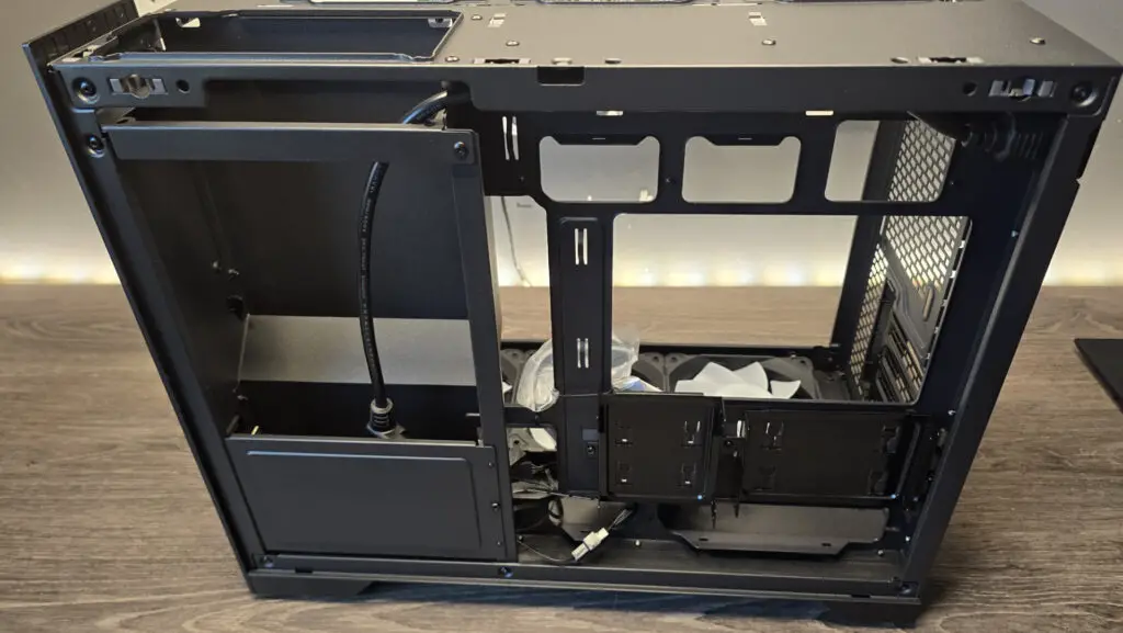 A technician building a PC inside the Phanteks XT V3.