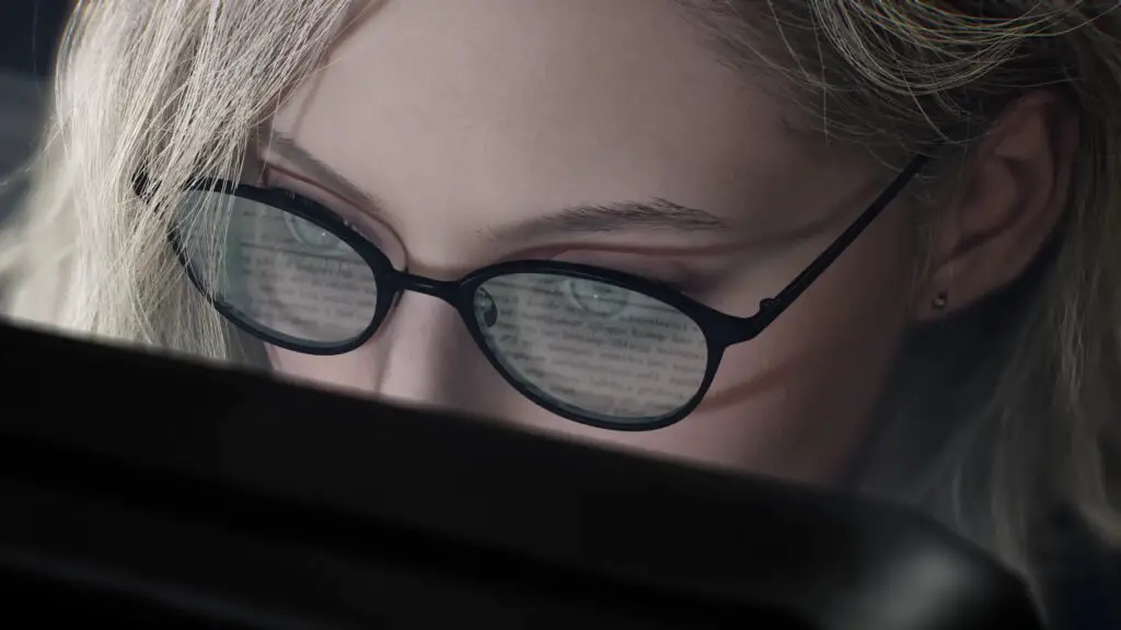 Resident Evil Requiem's Grace Ashcroft in a dark corridor