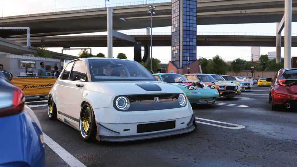 Forza Horizon 6: A white Honda with gold rims parked next to various other cars at a meet under a highway.