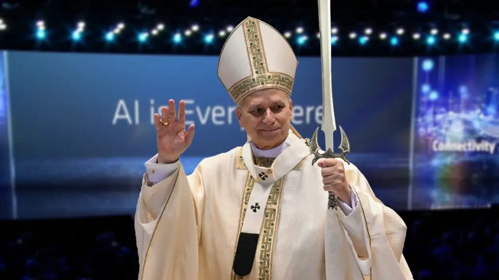 Pope Leo holds a photoshopped sword atop a slightly blurry image of an AMD AI presentation.