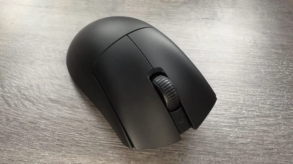 A photo of a Razer DeathAdder V3 HyperSpeed gaming mouse on a desk.
