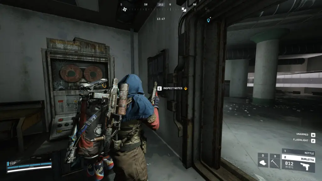 Arc Raiders Stable Housing: A player looking at a noticeboard next to a doorway.