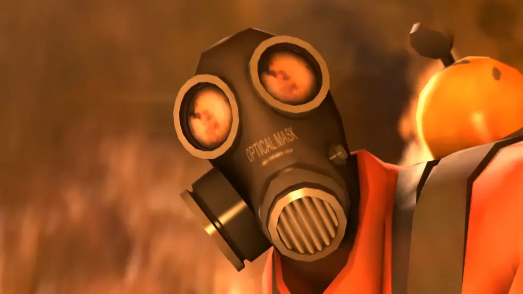 Meet the pyro screenshot showing close up of gas masked pyro character with flames reflected in eyepieces of mask