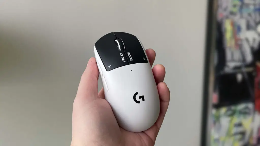 Logitech G Pro X2 Superstrike in a hand showing grip size
