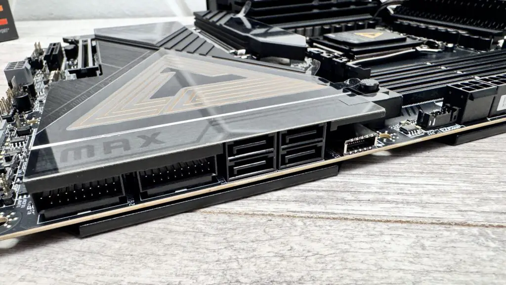 An MSI MEG X870E Ace Max motherboard on a desk.