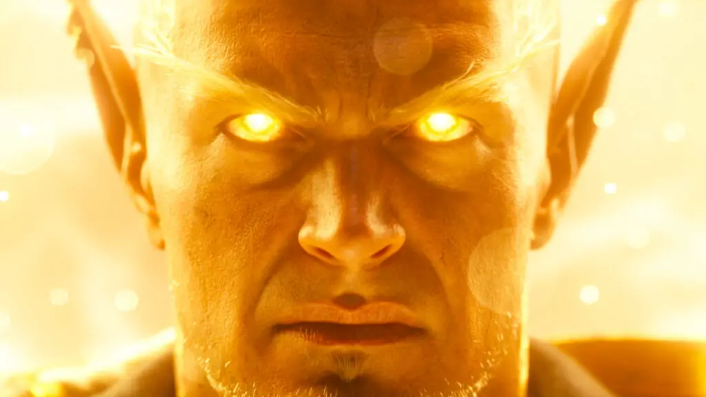 A cinematic still of a male elf from World of Warcraft: Midnight with glowing eyes.