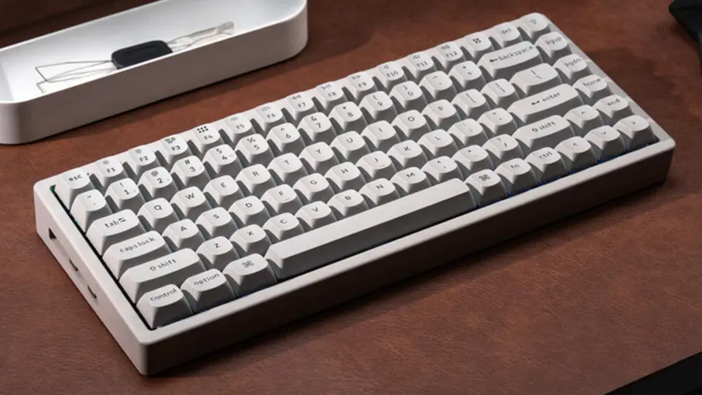 A Keychron K2 HE Concrete edition keyboard showing its stone-textured base