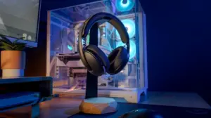The Logitech G325 gaming headset on a headphone stand.