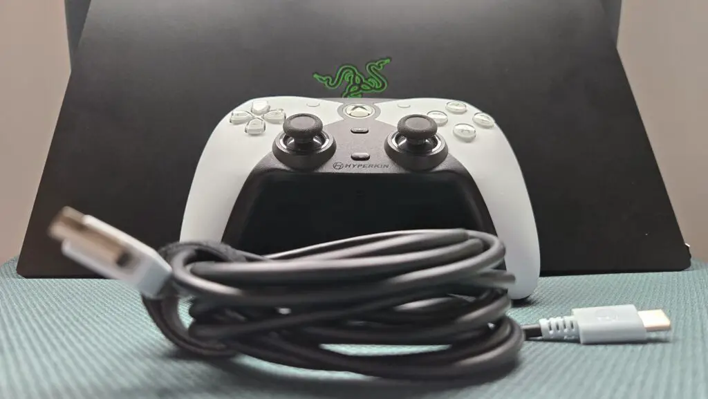 The Hyperkin Competitor on a gaming laptop.