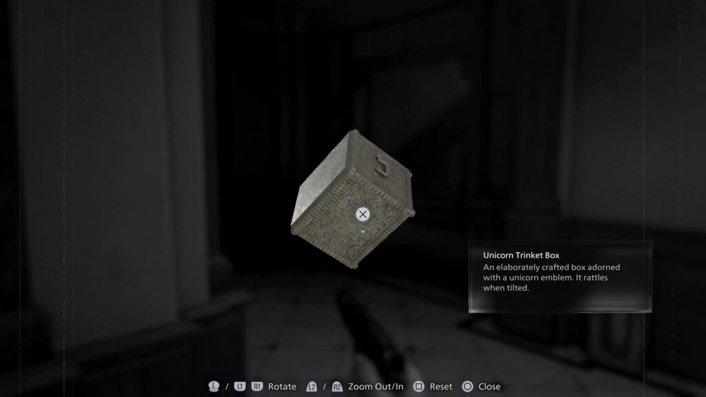 Resident Evil Requiem player examining the back of the trinket box